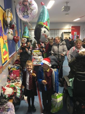 children and adults at event